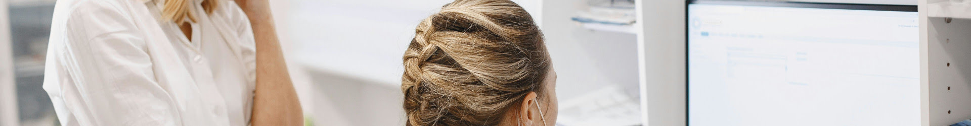 Healthcare data analytics and clinical workflow modernization with clinicians reviewing digital records and governance-ready systems